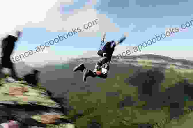 A Base Jumper Leaps From A Towering Cliff, His Body A Blur Against The Backdrop Of The Rugged Landscape. To The Xtreme (Xtreme Ops 2)