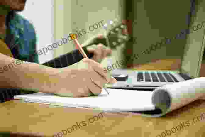 A Songwriter Working On A Laptop With Lyrics On The Screen How To Write Lyrics: Writing Better Words For Your Songs