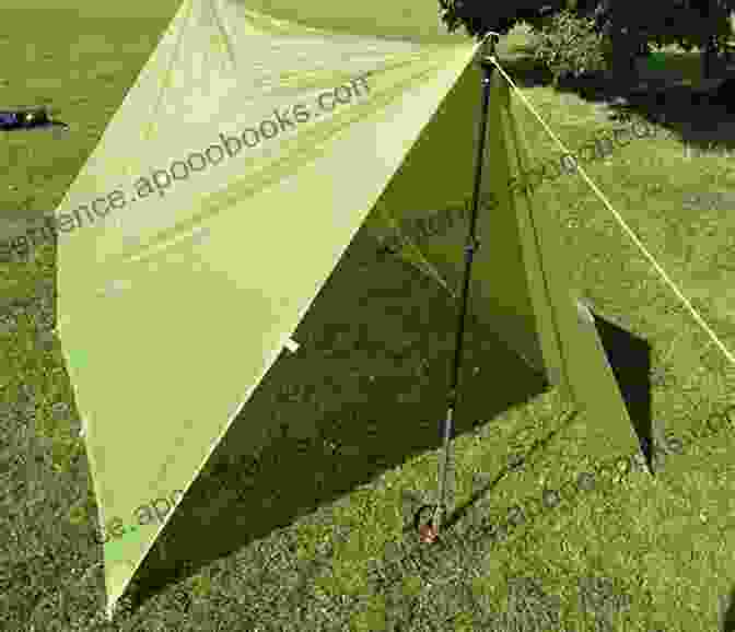 Camper Using A Tarp Ridgeline Hitch To Set Up A Tarp Shelter A Camper S Guide To Knots And Lashing A Collection Of Historical Camping Articles On Useful Knots For The Campsite