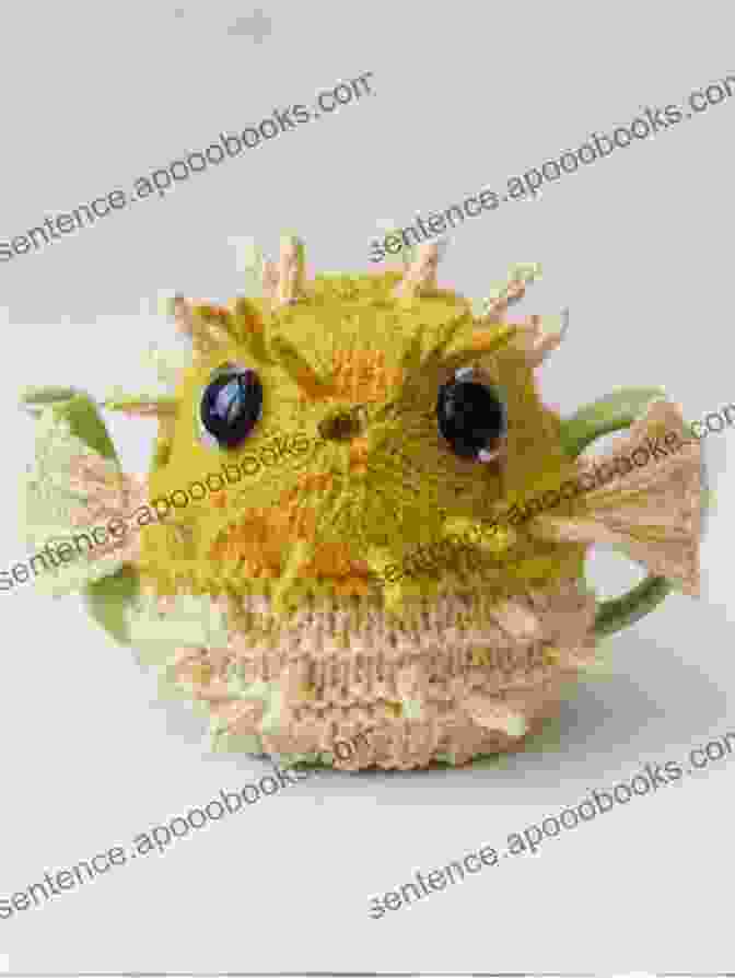 Close Up Of Pufferfish Tea Cosy Showing The Embroidered Eyes And Mouth Pufferfish Tea Cosy: Knitting Pattern