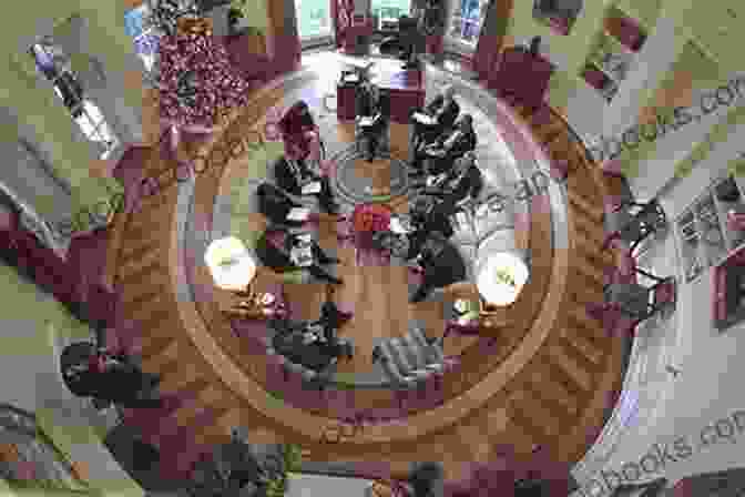 George Bush Meeting With His Advisors In The Oval Office. Worse Than Watergate: The Secret Presidency Of George W Bush