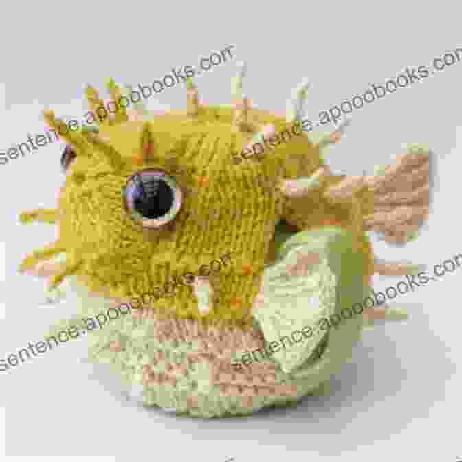 Pufferfish Tea Cosy Sitting On A Stack Of Books Pufferfish Tea Cosy: Knitting Pattern