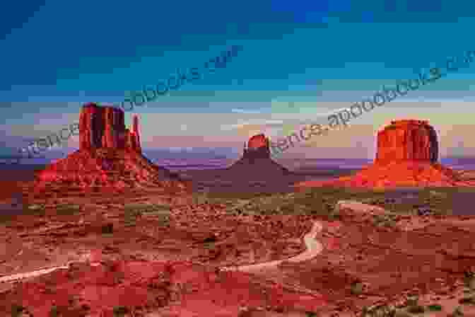 The Iconic Monument Valley, Showcasing The Surreal Rock Formations And Vast Expanse Of The Southwest. Whispers Of The South West